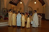 Four priests and 11 altar boys served in the Altar